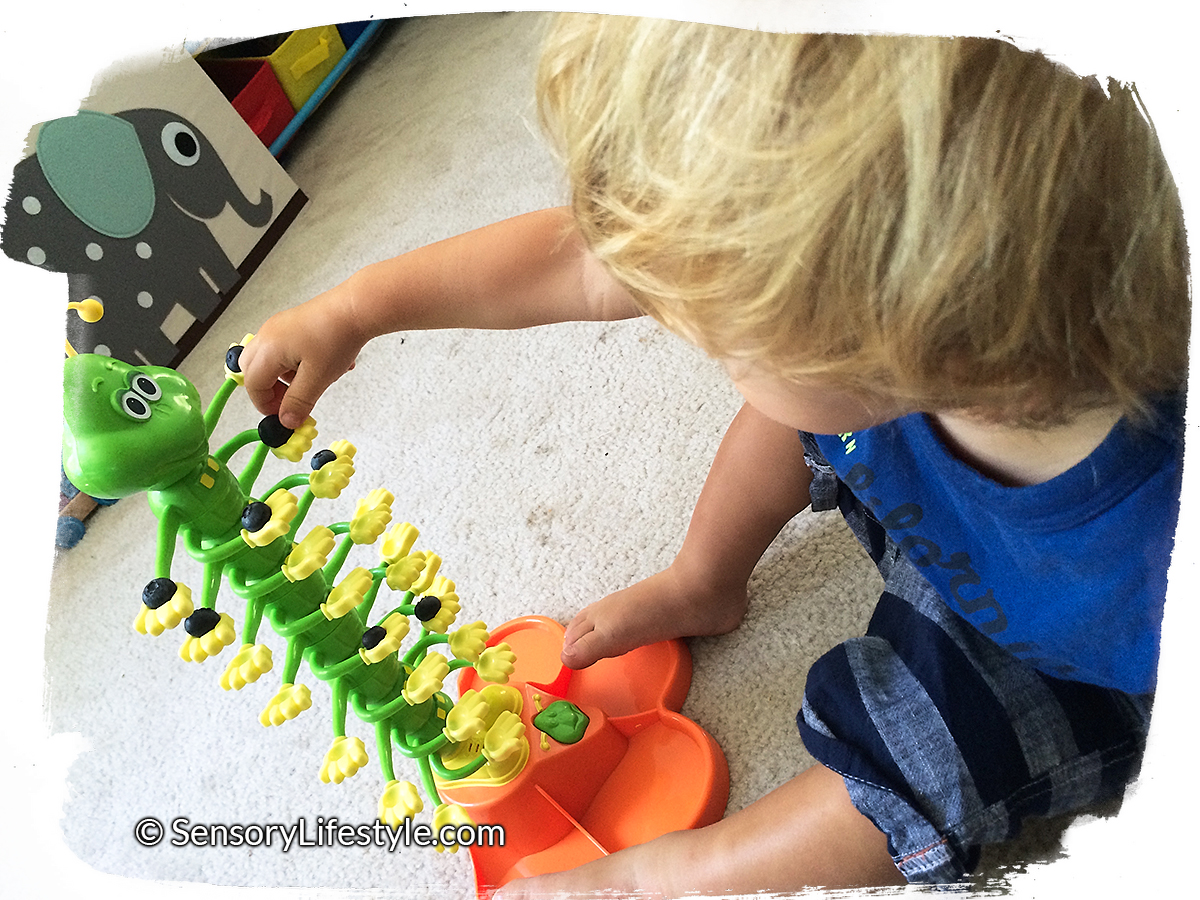 Dancing caterpillar with blueberries